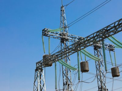 Modern electrical substation on sunny day, low angle view